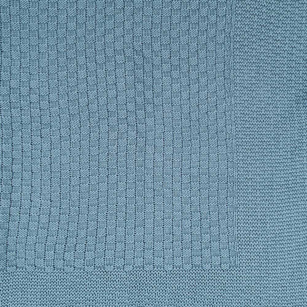 Copertina a maglia blu in cotone biologico
